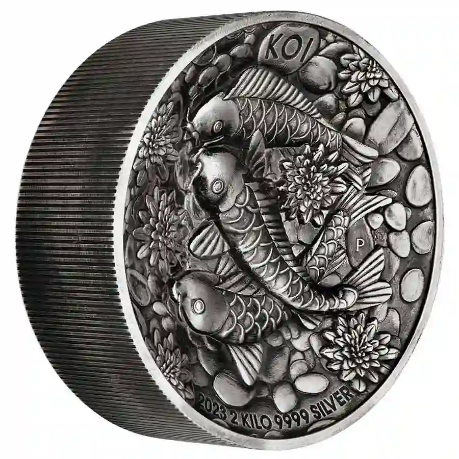 01-2023-Koi-Fish-2-Kilo-Silver-Antiqued-High-Relief-Coin-OnEdge-HighRes Koi Fish URH 2 kilo Silver Coin